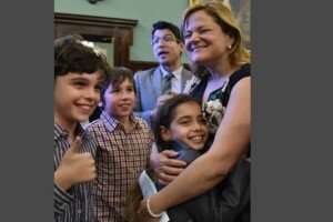 City Council Speaker Melissa Mark-Viverito hugs a student from the Lower East Side's Earth School during a meeting to brainstorm ways to advocate for an LGBT-inclusive curriculum in their elementary school.